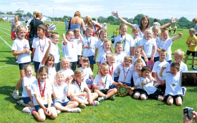 Tenby Infants School was the winning school in the large schools category. Medals were presented by Anne Ryder Richardson, of Manor Park.
