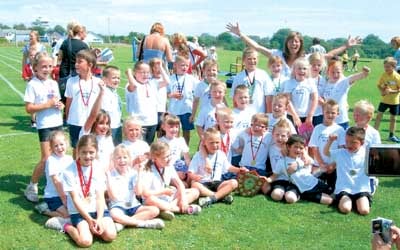 Tenby Infants School was the winning school in the large schools category. Medals were presented by Anne Ryder Richardson, of Manor Park.
