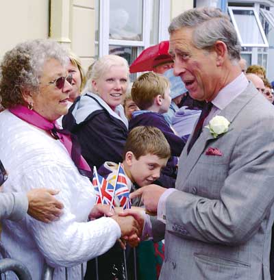 Well-wishers greet the Prince of Wales outside our offices during his last visit seven years ago.