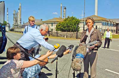 Chevron spokesperson Jane James speaks at a press briefing outside the refinery. Pic Martin Cavaney Photography