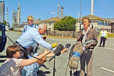 Chevron spokesperson Jane James speaks at a press briefing outside the refinery. Pic Martin Cavaney Photography