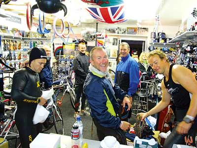 Members meet at 6 am in the shop before the Ironman Wales start.