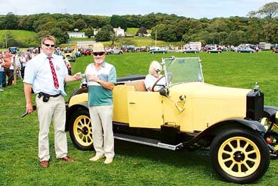 From 20 entries, Peter Morris presents David Gilbert with the trophy for the best classic car.
