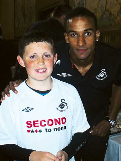 Thomas is pictured with one of his favourite players, Scott Sinclair.