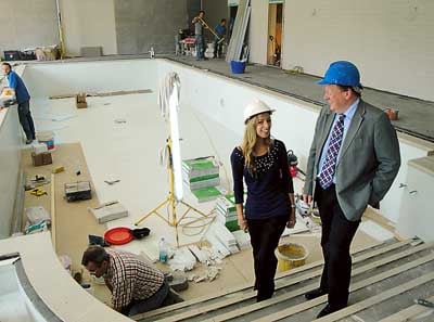 Kristal Wright with Phil Thomas check out the work taking place.