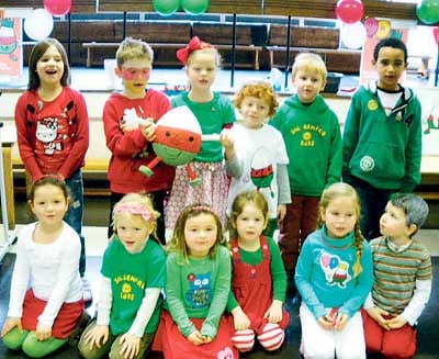 Children from Golden Grove School dressed up in red white and green to celebrate Mr. Urdd being 90. Funds raised will go towards the 2013 Urdd Eisteddfod which is being held in Pembrokeshire.