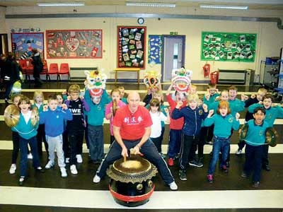 Class 3 of Ysgol Gelli Aur/Golden Grove School last week celebrated the Chinese New Year by learning about the Chinese Dragon Dance. They wore authentic dragon headwear and played instruments to wake the dragon.