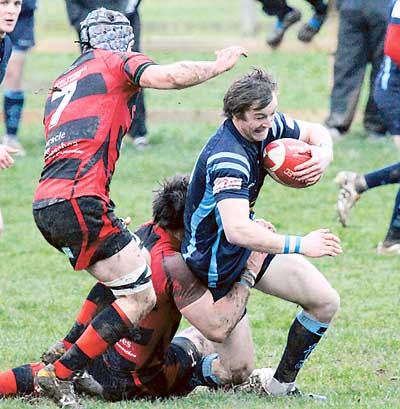 Centre and captain Steve Martin tries to break free of the Athletic defence.