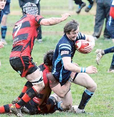 Centre and captain Steve Martin tries to break free of the Athletic defence.