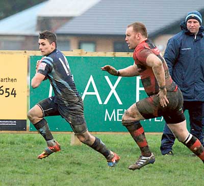 One for the future! Eighteen-year-old Narberth winger Will Lewis makes a telling break.