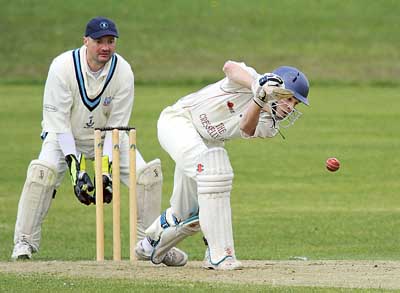 Matthew Morgan gets down low to take runs for Cresselly.