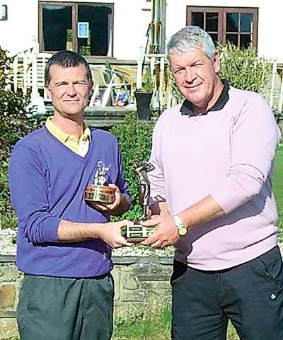Tim Davies presenting Steve Cole and Mackie Harts with the Peter Nobes Salvers.
