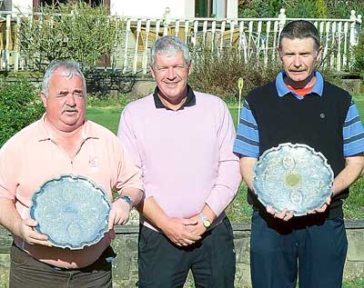 Tim Davies presenting Steve Cole and Mackie Harts with the Peter Nobes Salvers.