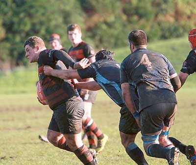 Geoff Martin on the charge for Tenby.