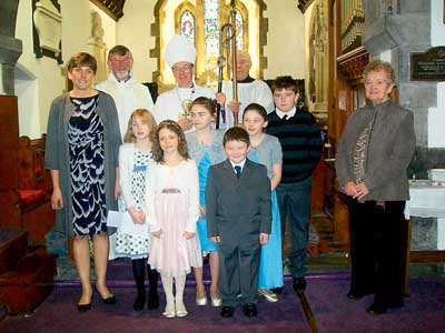 The candidates confirmed and baptised by Bishop Wyn at Jeffreyston Church on Sunday.