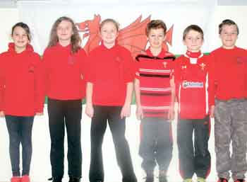 Pictured are pupils Chelsea, Elisha, Esme, Daniel, Lewys and Gryff who competed at the cross country event.