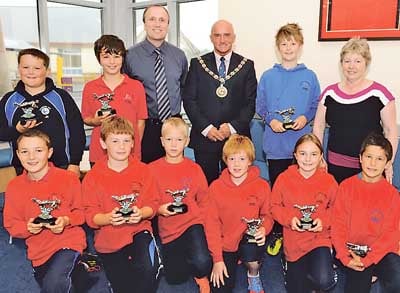 Narberth CP School Rugby League team: Jac, Talfan, Griff, Tomas, Lewys, Jordan, Rhys, Ffion, Harri, with Clr. Peter Morgan, chairman of Pembrokeshire County Council, with Mr. Paul Harries and Mrs. Edna Davies (head). The team achieved second place in the recent Welsh Rugby League finals at Neath.