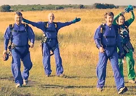 The triumphant fundraisers on the ground.