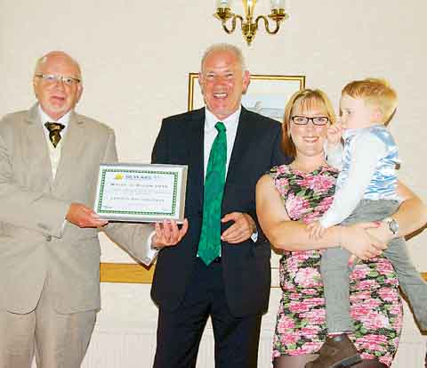 Nigel and Emily from Amroth Bay Holidays receive their Wales in Bloom certificate.
