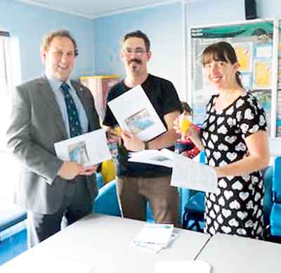 Clr. Elwyn Morse, Ben Furgusson-Walker and Kelly Harrison with the new share offer document.
