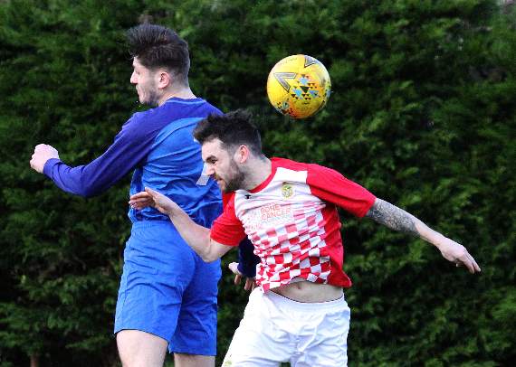 Fraser Finlay and Chris Millward challenge for the ball. Pic Susan McKehon