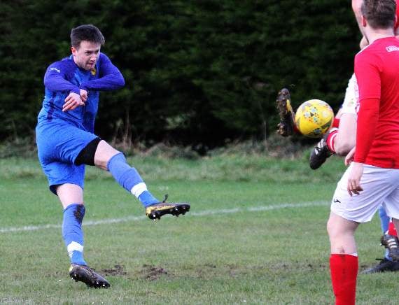 Shaun Whitfield opens the scoring for Carew with a shot into the roof of the net. Pic Susan McKehon