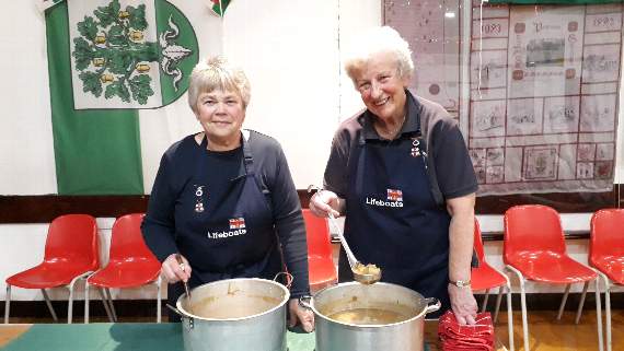 Joan Giles, souvenir secretary, and Sandra Thompson serving up the cawl
