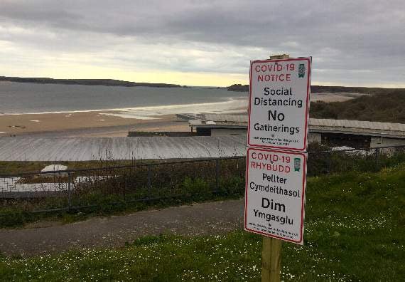 Signage by the Jubilee play park overlooking Tenby's South Beach