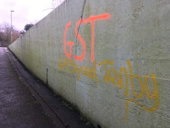Walls in the vicinity have been graffitied