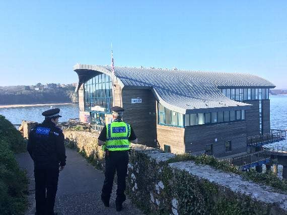 Police officers on a walkabout around Tenby’s Castle Hill area offering reassurance to the public that large gatherings of people are not taking place in the town (Observer Pic)