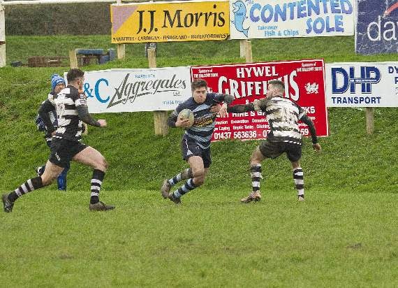 Dafydd Pritchard racing towards the Cross Keys line. Pic Elwyn Davies