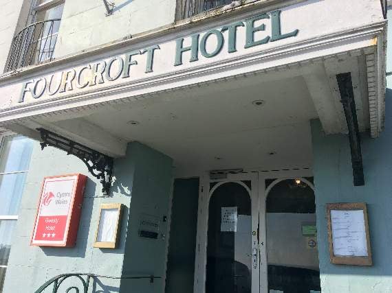 Signs appeared in the doors of Tenby hotels and guest houses to sty they were closed (Observer pic)