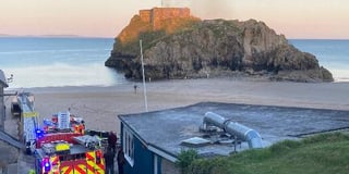 Tenby island fire caused by unburned wood