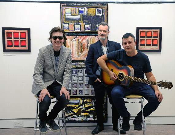 Nicky Wire at the opening of his exhibition with James Dean Bradfield and Tenby Museum curator Mark Lewis (Pic. Gareth Davies Photography)
