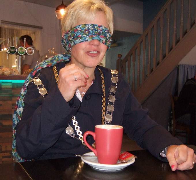 The hardest part was putting down her cup in the saucer.