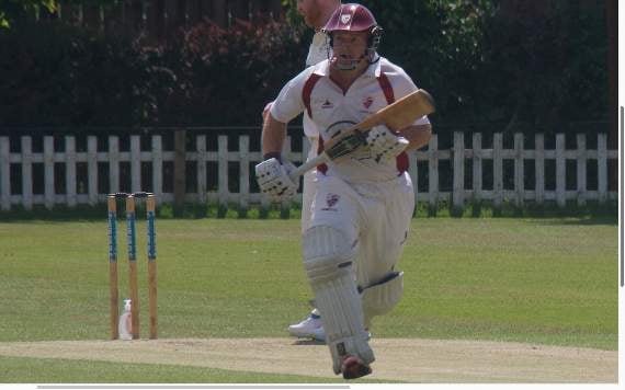 Charlie Bendall runs between the wickets.