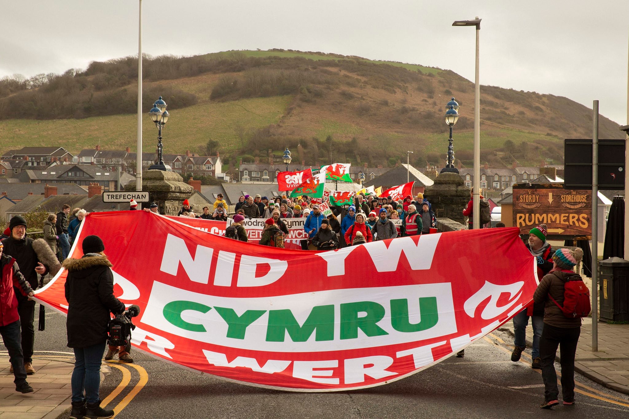 Protesters crossing Trefechan bridge on Saturday