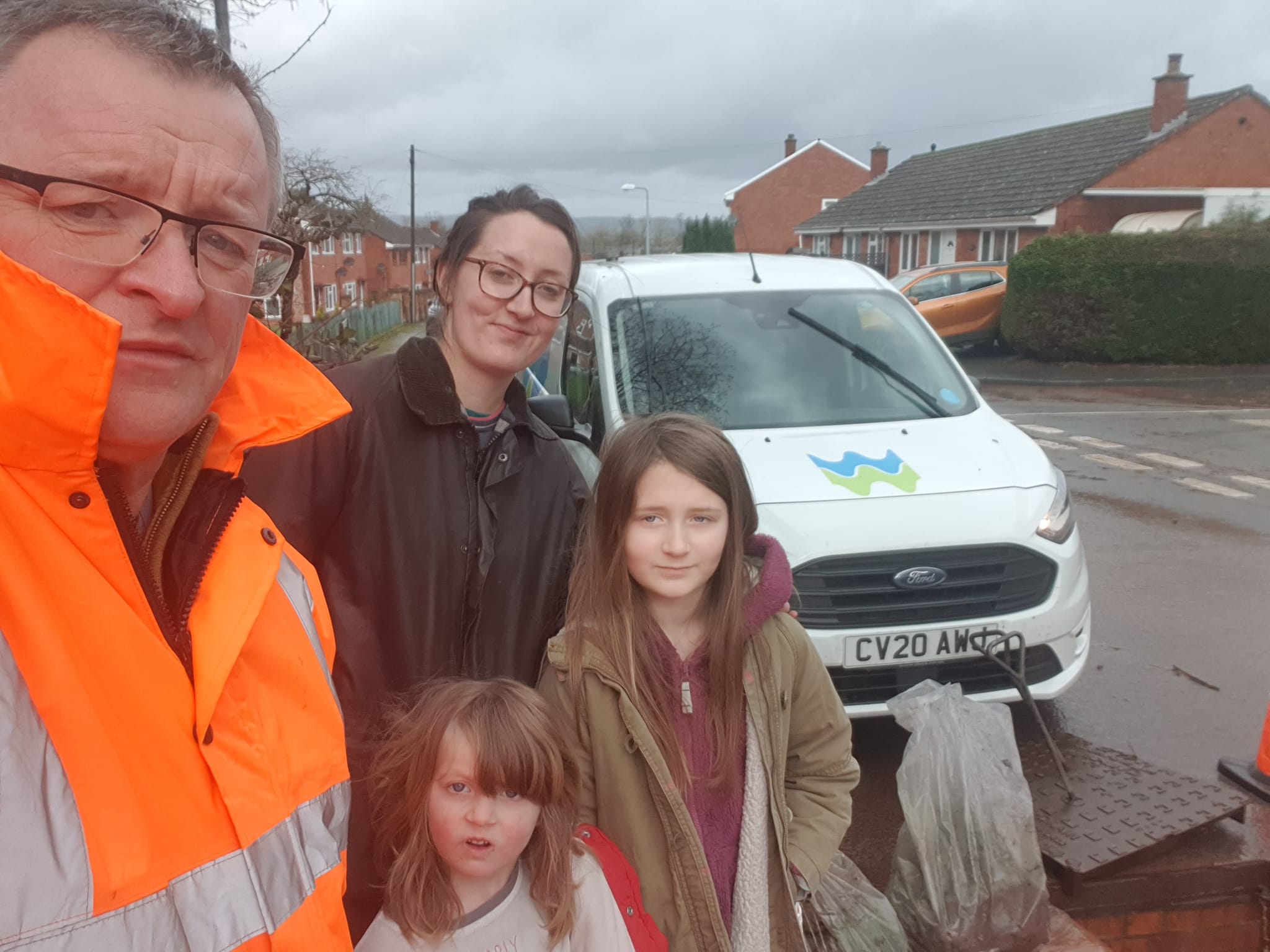 Talgarth Mum Sarah Griffiths with concerned Ysgol y Mynydd Du Eco Committee members