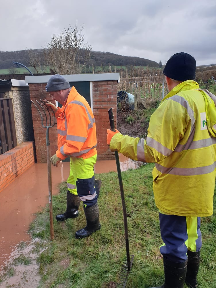 Julian Williams and Paul Smith, Powys County Council Highways Emergency team, helped avert a more serious flood event