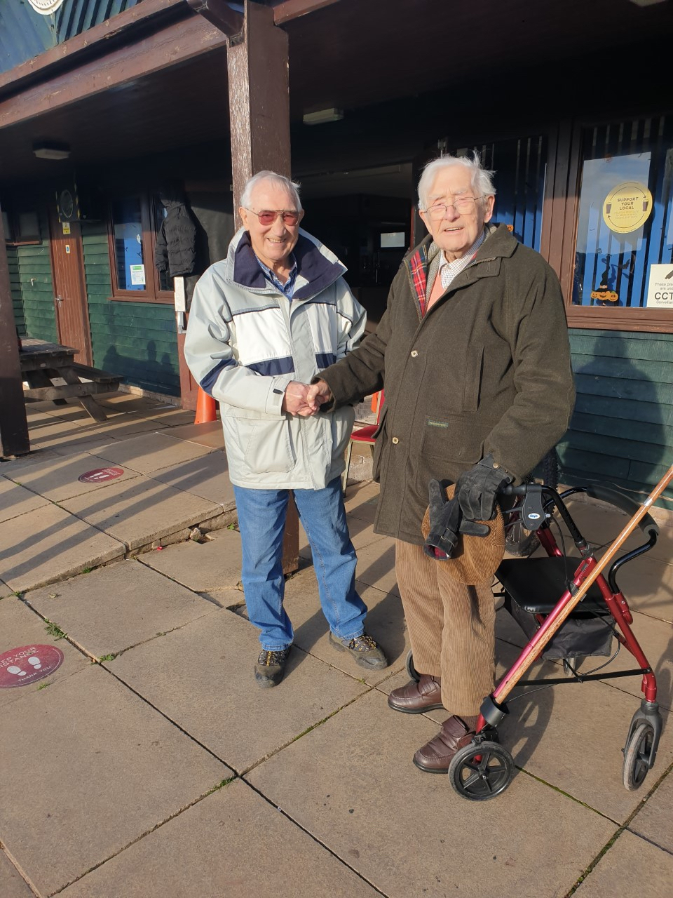 In his ambassadorial role, he greets local resident and Builth Wells FC President, Ray Shaw, during the Talgarth v Builth fixture last Autumn.