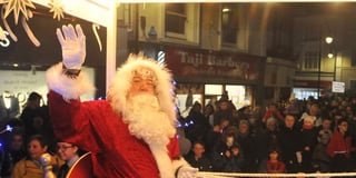 Santa lights the way as he spreads a little Christmas magic in Newton