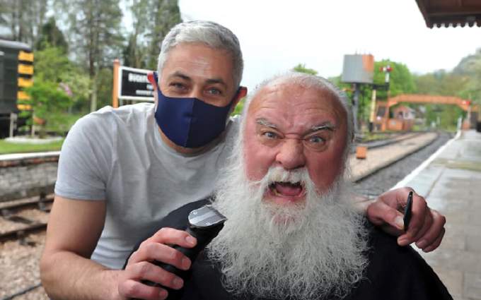 Dick Wood gets a beard shave after 14 months of lockdown.