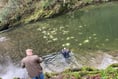 Major clean up after tiles dumped in river at Denham Bridge
