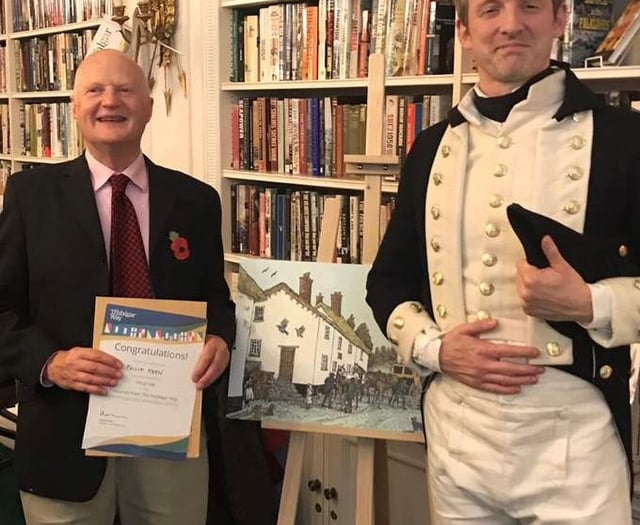 Local artist wins top award for village 'postcard' artwork
