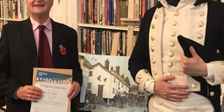 Local artist wins top award for village 'postcard' artwork