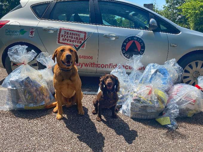Cooper and Maggie with some of the seized items.