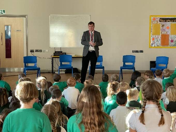 Mel Stride talking to the school assembly at Newton St Cyres Primary School on January 14.