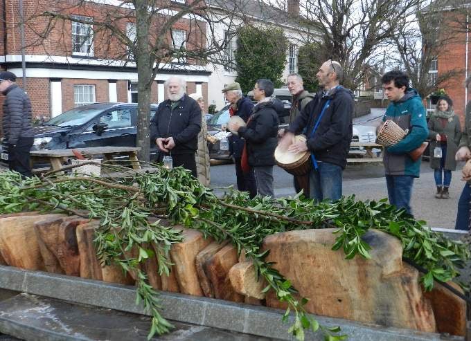 The fragments of the oak bench on the trailer had been covered with branches for their winter sleep. NP 016022 02