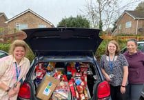 Christmassy food donated by Landscore Primary School to Crediton Foodbank