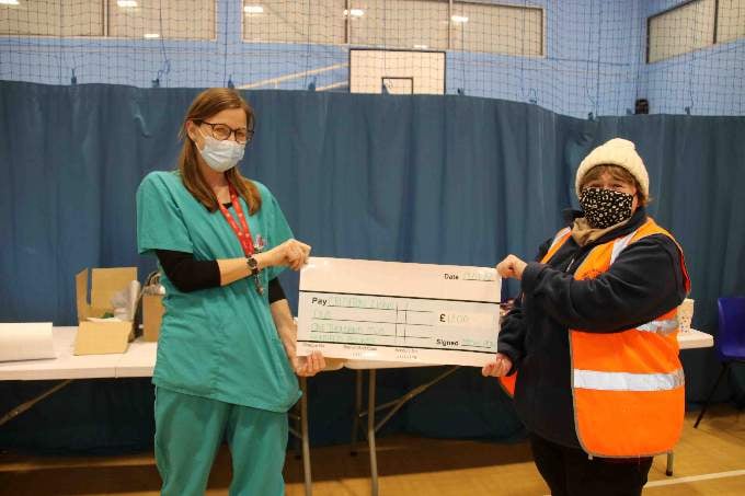 Dr Jo Harris, left, presented a cheque for £1,200 to Crediton Lions President Hazel Evely. AQ 4942